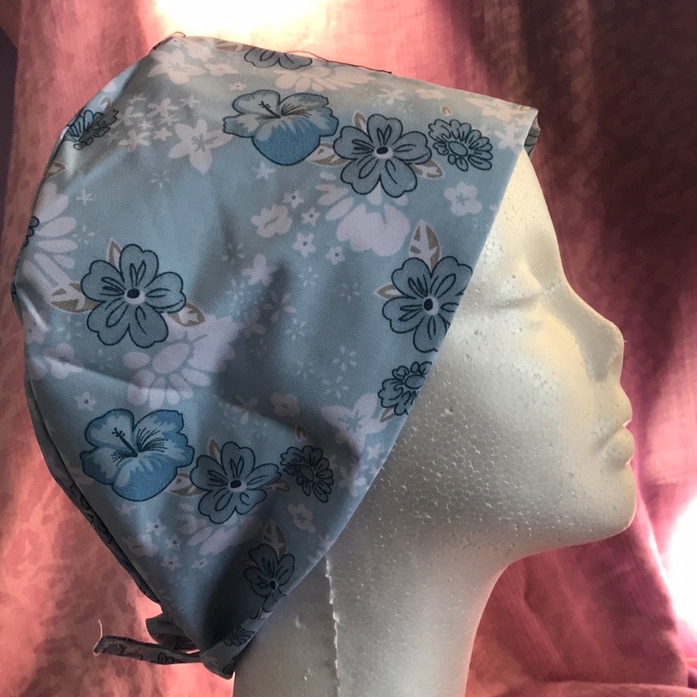 Light blue scrub cap with floral design